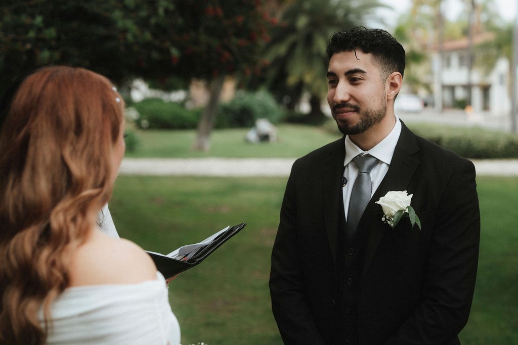 Bryant listening during the Santa Barbara Courthouse ceremony