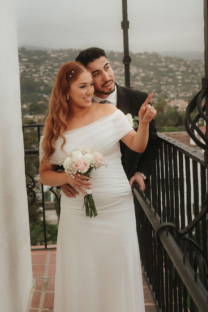 Vanessa and Bryant laughing together during courthouse portraits